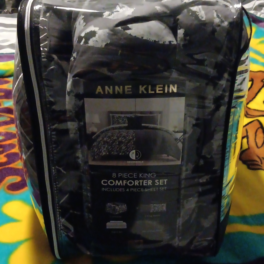 8 piece King comforter Set includes 4piece sheet set